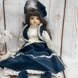 Seymour Mann Porcelain Doll Blue Velvet